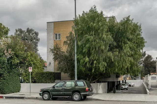 a car parked in front of a house