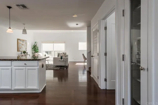 a view of living room with granite countertop furniture and fireplace