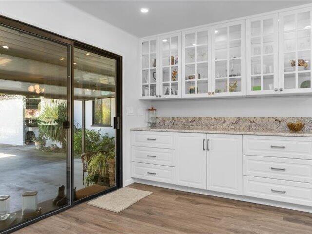 195 Howell Avenue Red Bluff, CA 96080 - Photo 13 of 66 a view of granite countertop wooden floor and a window