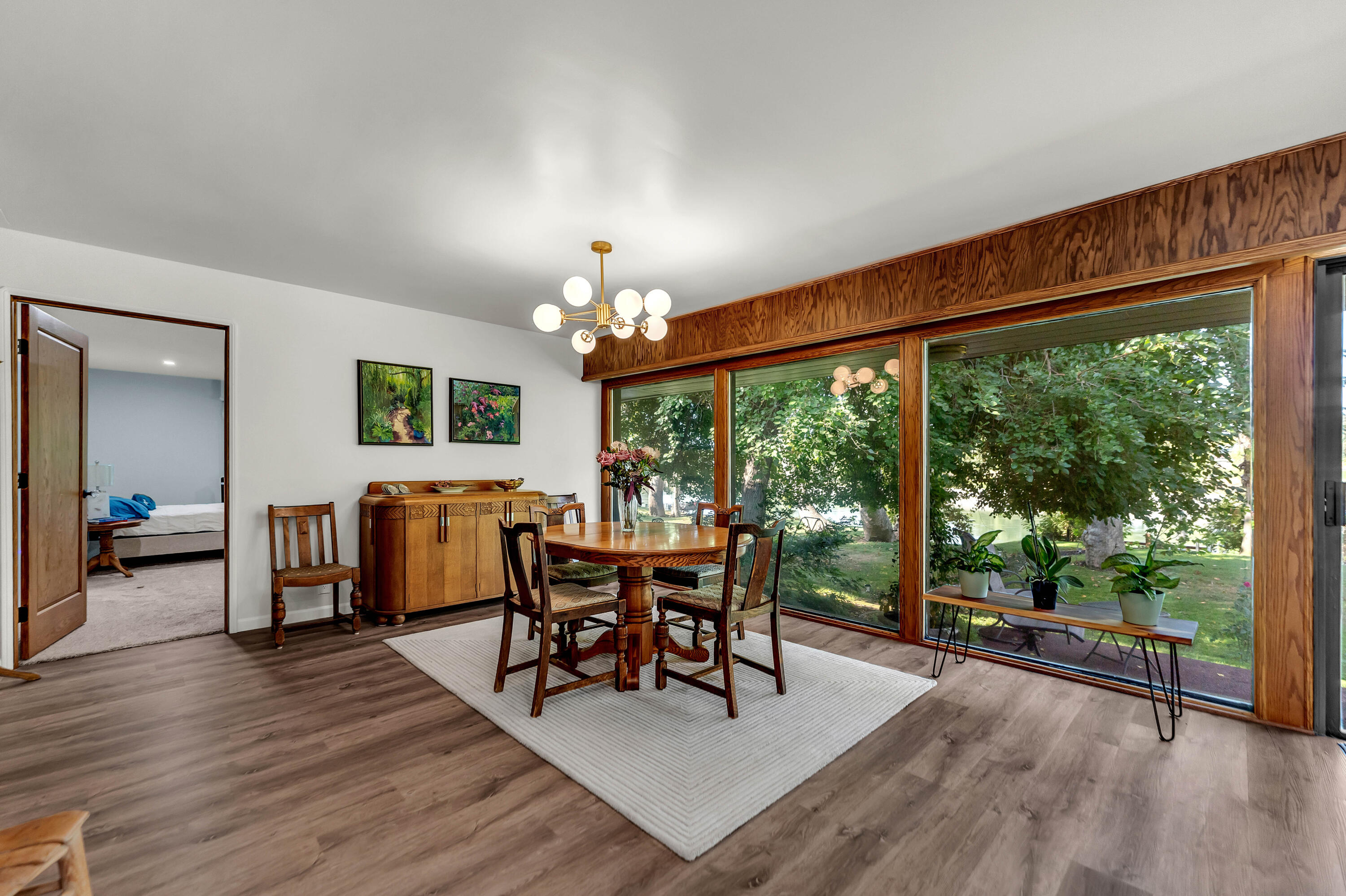 195 Howell Avenue Red Bluff, CA 96080 - Photo 14 of 66 a view of a dining room with furniture window and wooden floor
