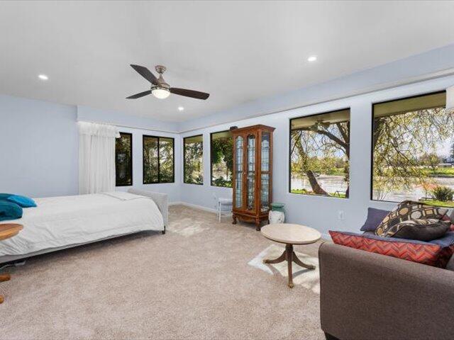 195 Howell Avenue Red Bluff, CA 96080 - Photo 17 of 66 a living room with furniture and a large window