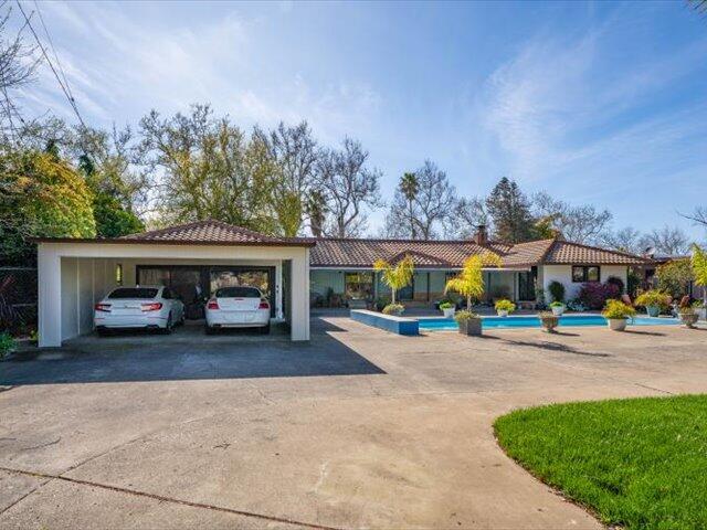 195 Howell Avenue Red Bluff, CA 96080 - Photo 3 of 66 a view of a car parked in front of a house