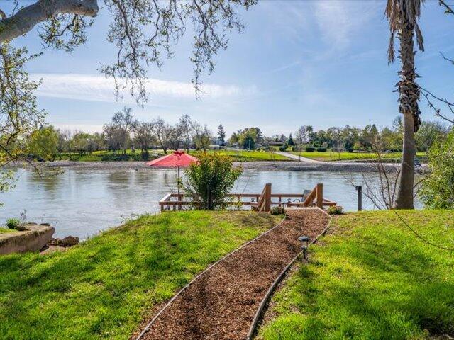 195 Howell Avenue Red Bluff, CA 96080 - Photo 39 of 66 a view of a lake with houses in the back