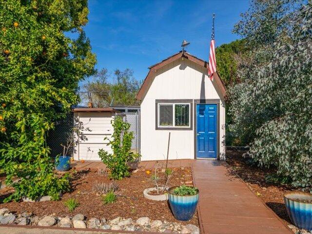 195 Howell Avenue Red Bluff, CA 96080 - Photo 51 of 66 a view of a house with potted plants