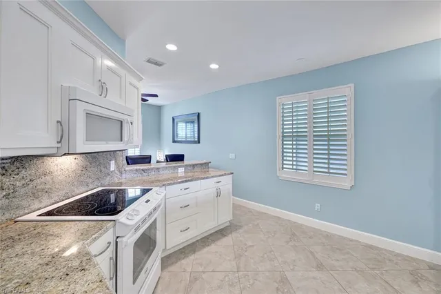 $6,000 | 5945 Sand Wedge Lane, Unit 1003, Naples, FL 34110