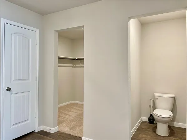 a bathroom with a toilet