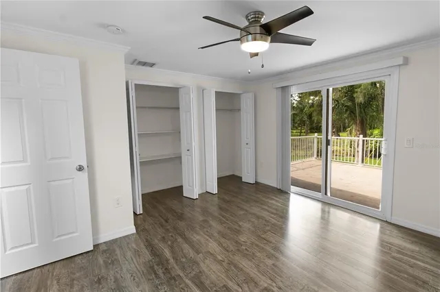 an aerial view of a house with roof deck and sitting area
