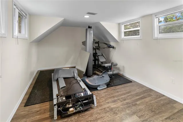 a pathway of a house with a yard