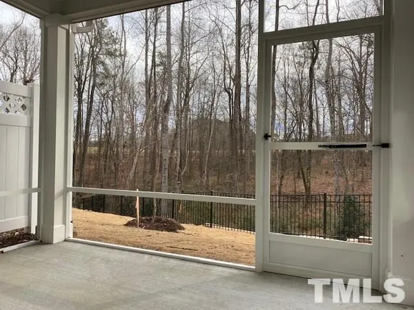 a view of backyard with green space