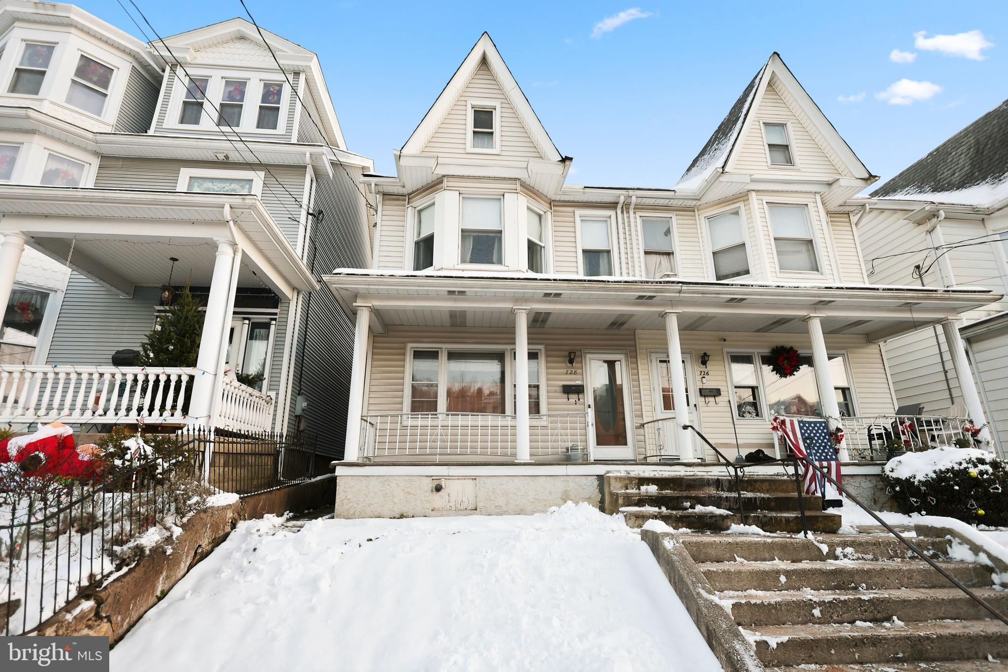 728 East Broad Street Tamaqua, PA 18252 - Photo 1 of 26 a view of a white building