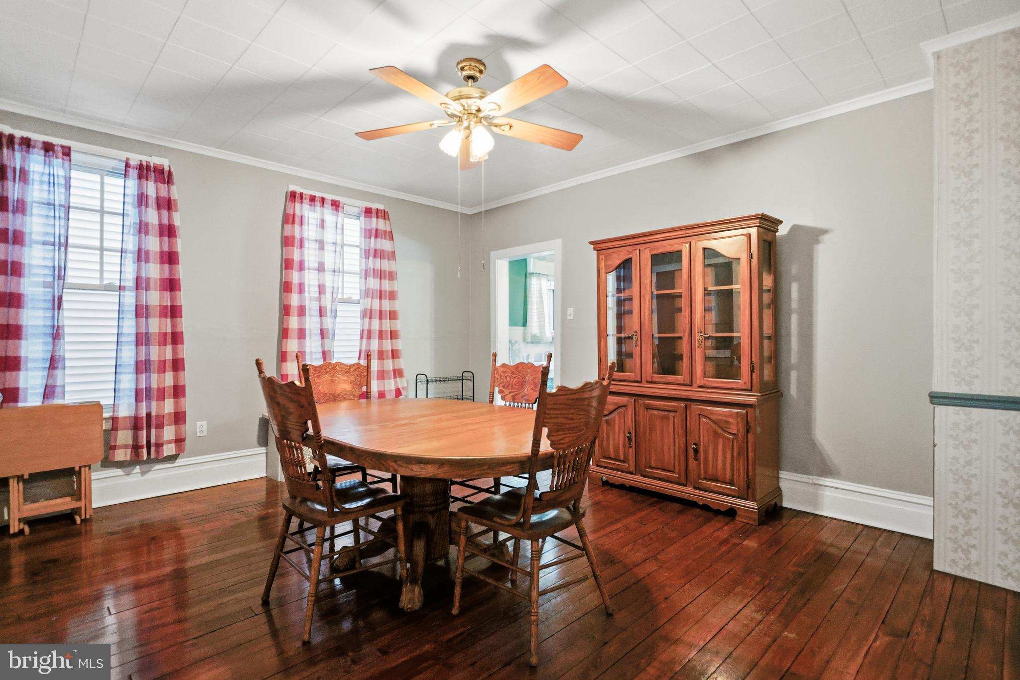 728 East Broad Street Tamaqua, PA 18252 - Photo 8 of 26 a view of a dining room with furniture window and wooden floor
