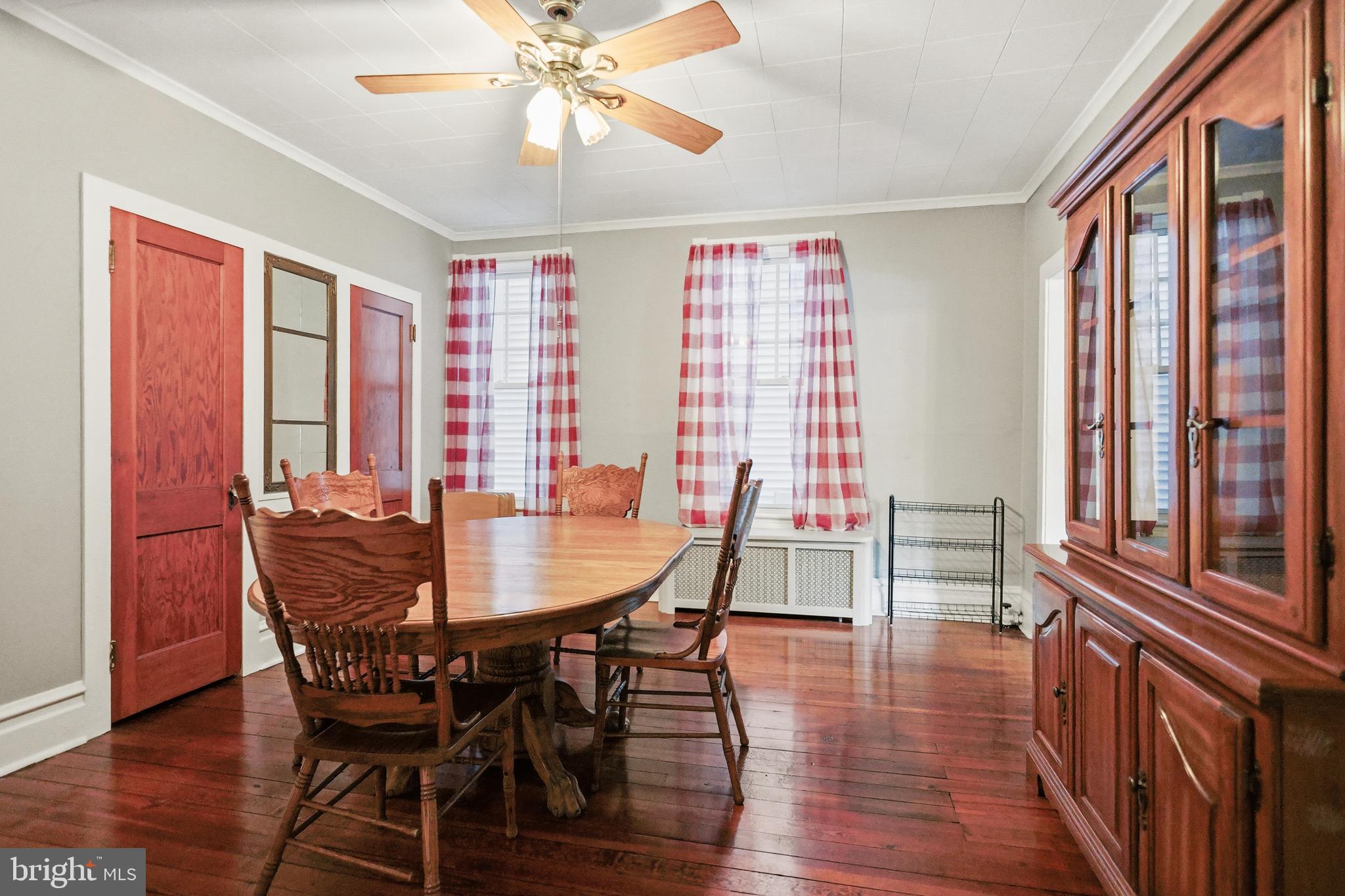 728 East Broad Street Tamaqua, PA 18252 - Photo 9 of 26 a view of a dining room with furniture window and wooden floor