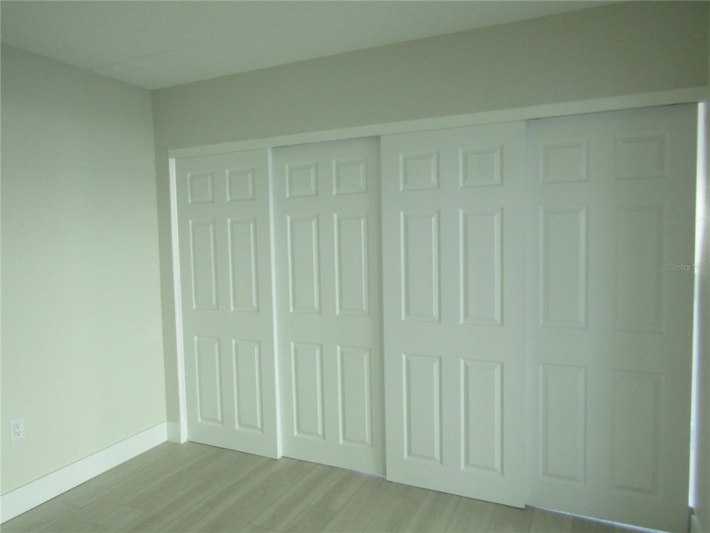 999 Inlet Circle, Unit D101 Venice, FL 34285 - Photo 14 of 29 a view of wooden floor