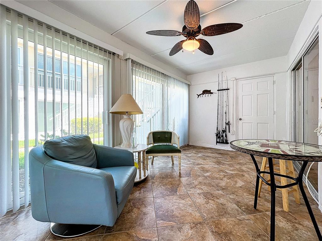 999 Inlet Circle, Unit D101 Venice, FL 34285 - Photo 20 of 29 a living room with furniture and a window