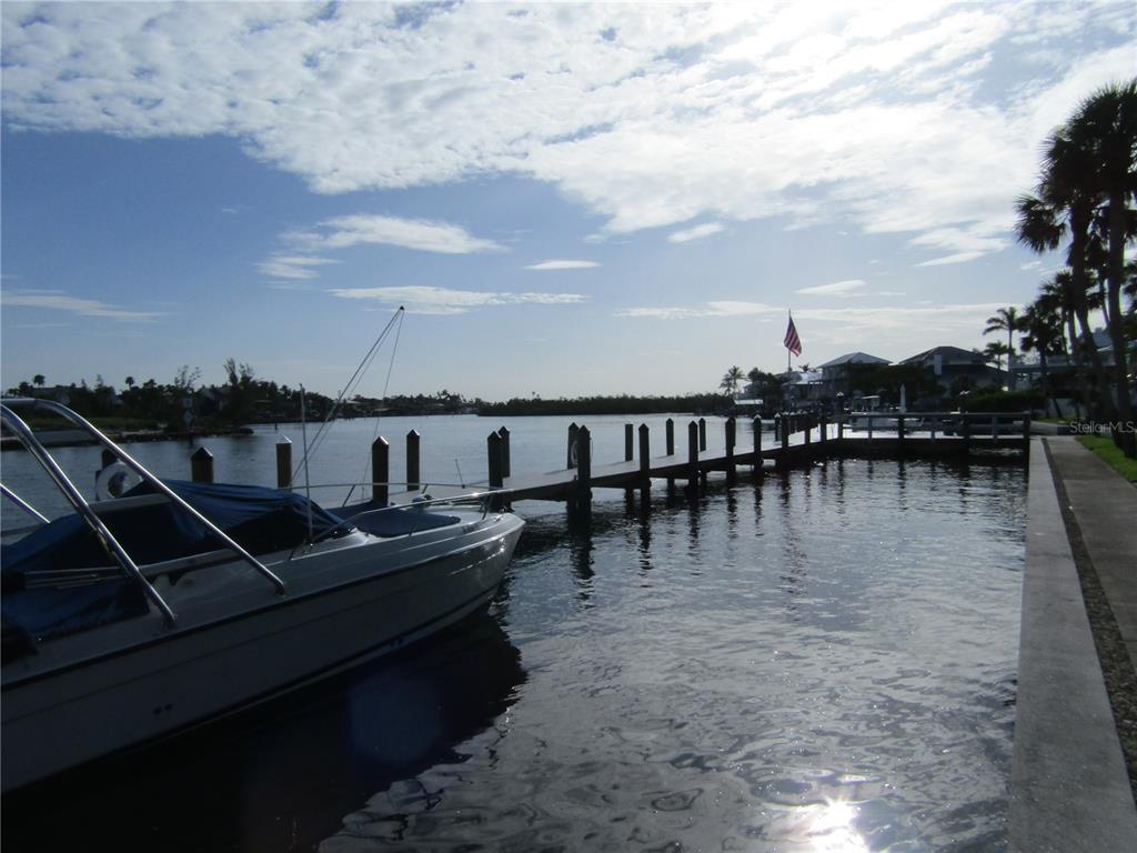 999 Inlet Circle, Unit D101 Venice, FL 34285 - Photo 22 of 29 a view of a lake with boats