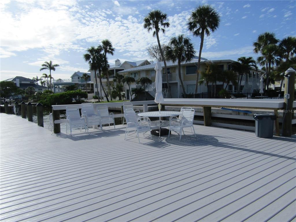999 Inlet Circle, Unit D101 Venice, FL 34285 - Photo 23 of 29 a view of a terrace with sitting area