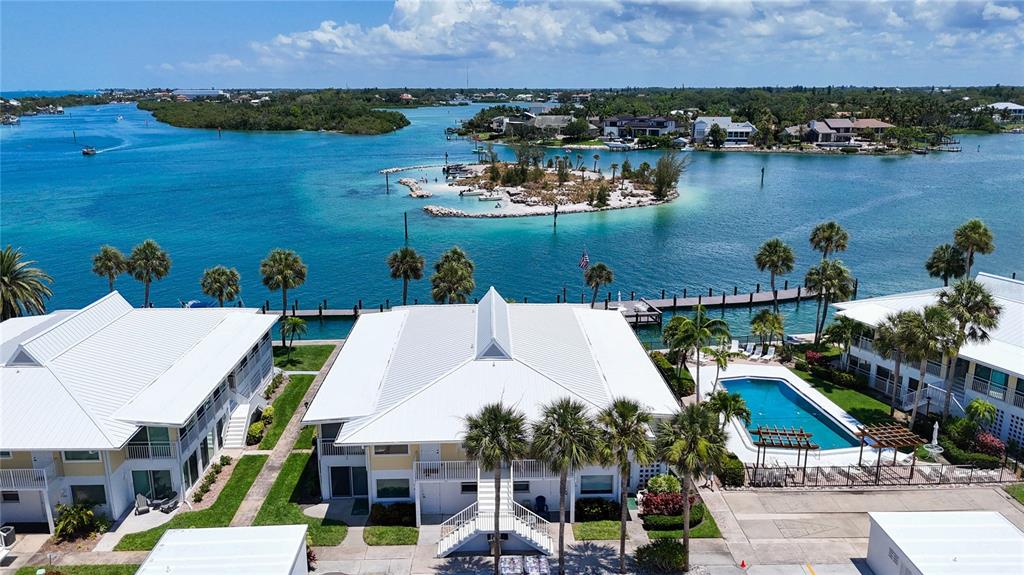 999 Inlet Circle, Unit D101 Venice, FL 34285 - Photo 3 of 29 an aerial view of a house with a lake view