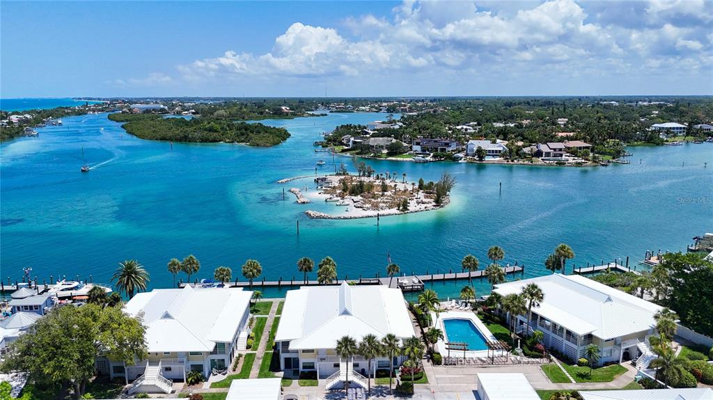 999 Inlet Circle, Unit D101 Venice, FL 34285 - Photo 4 of 29 an aerial view of a house with a lake view