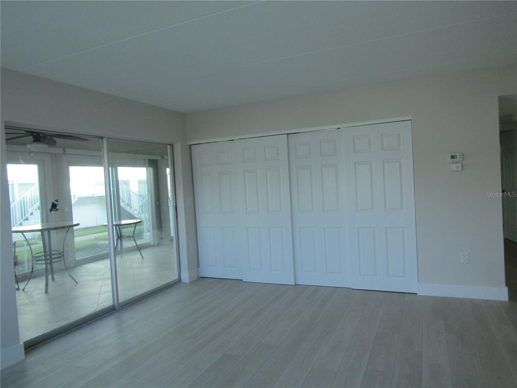 999 Inlet Circle, Unit D101 Venice, FL 34285 - Photo 8 of 29 a view of an empty room and window