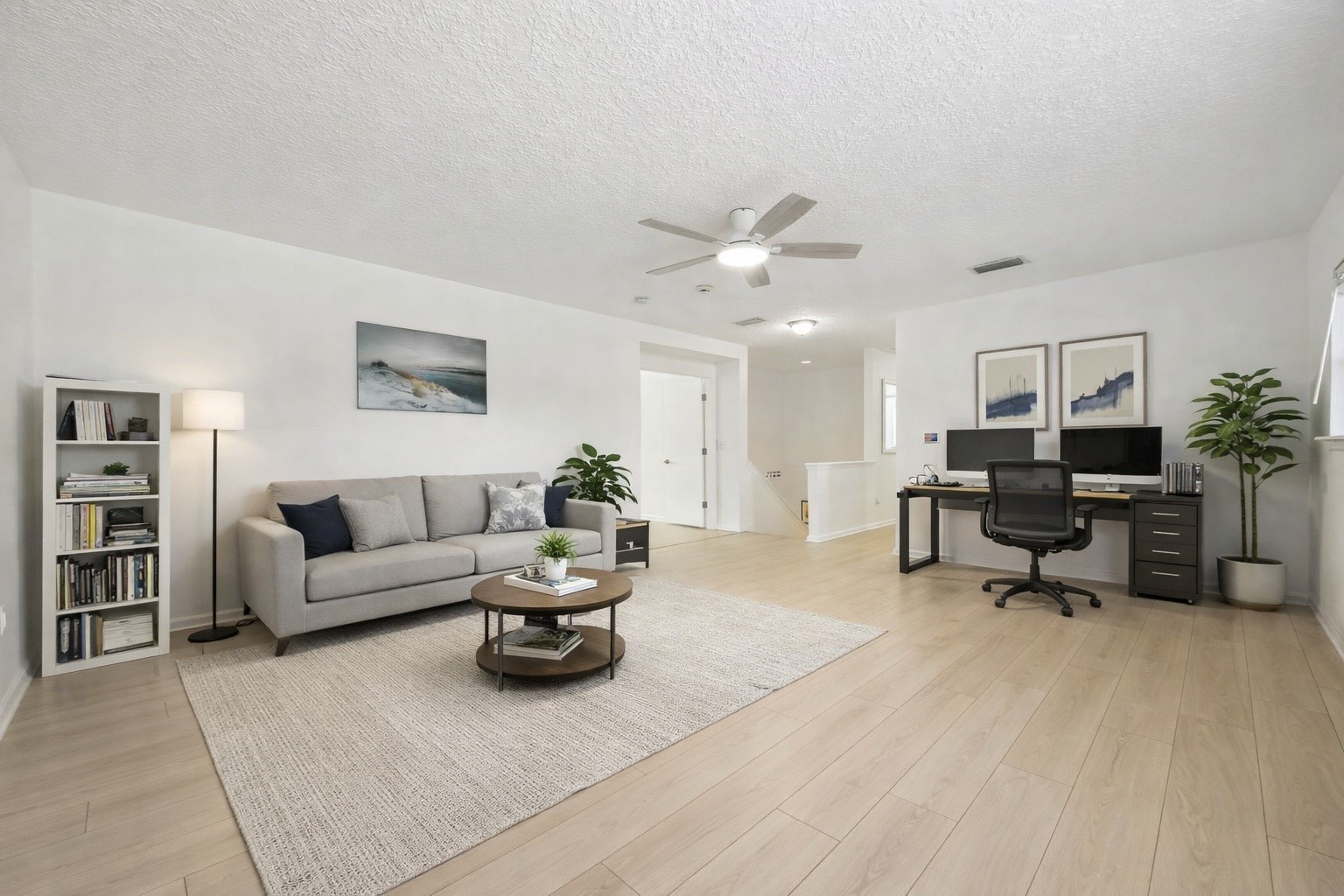 76002 Tideview Lane Yulee, FL 32097 - Photo 19 of 58 a living room with furniture and a large window