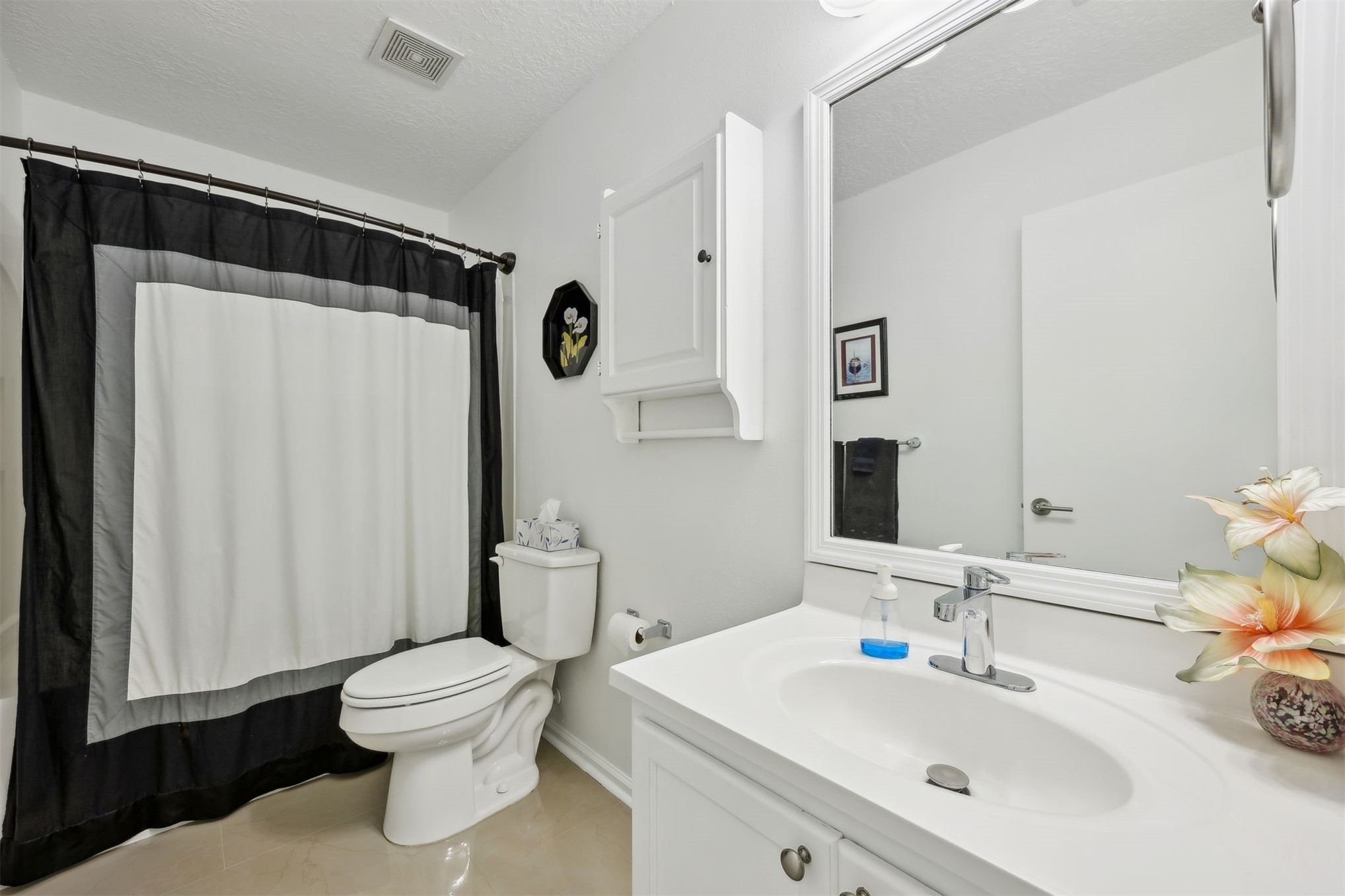 76002 Tideview Lane Yulee, FL 32097 - Photo 31 of 58 a bathroom with a sink toilet and shower