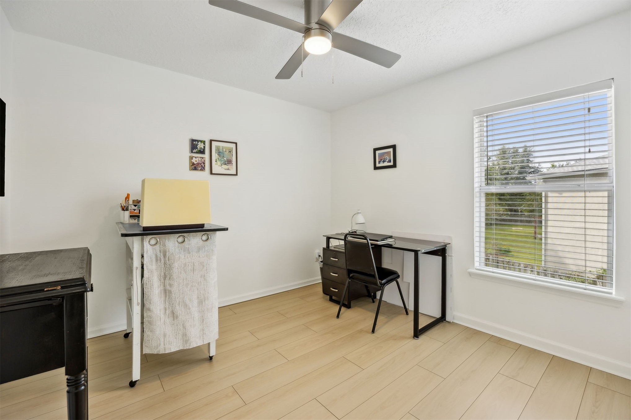 76002 Tideview Lane Yulee, FL 32097 - Photo 33 of 58 a living room with furniture a piano and a window