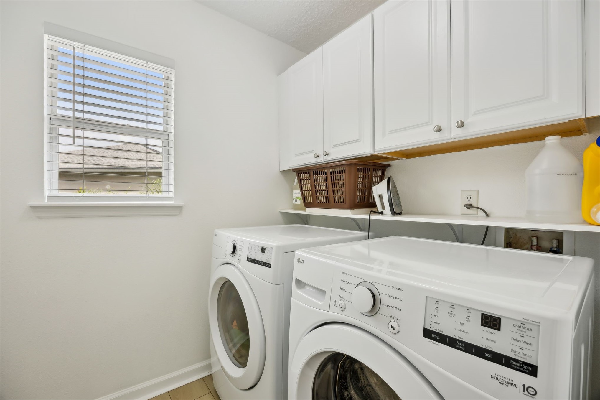 76002 Tideview Lane Yulee, FL 32097 - Photo 34 of 58 a utility room with dryer and washer