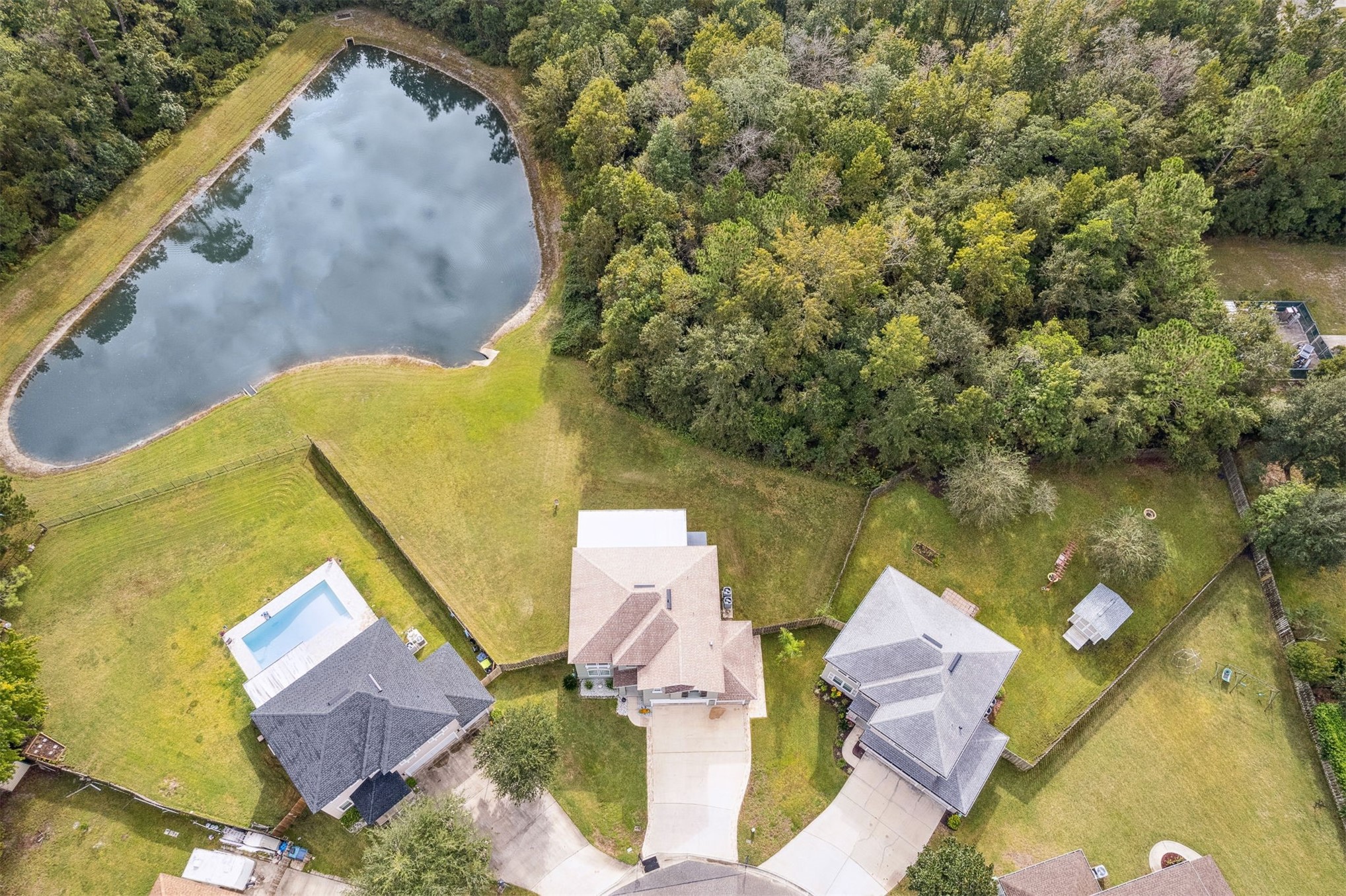 76002 Tideview Lane Yulee, FL 32097 - Photo 46 of 58 an aerial view of a house with outdoor space and a lake view