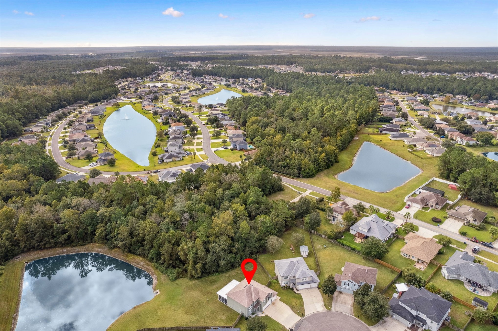 76002 Tideview Lane Yulee, FL 32097 - Photo 49 of 58 an aerial view of residential houses with outdoor space