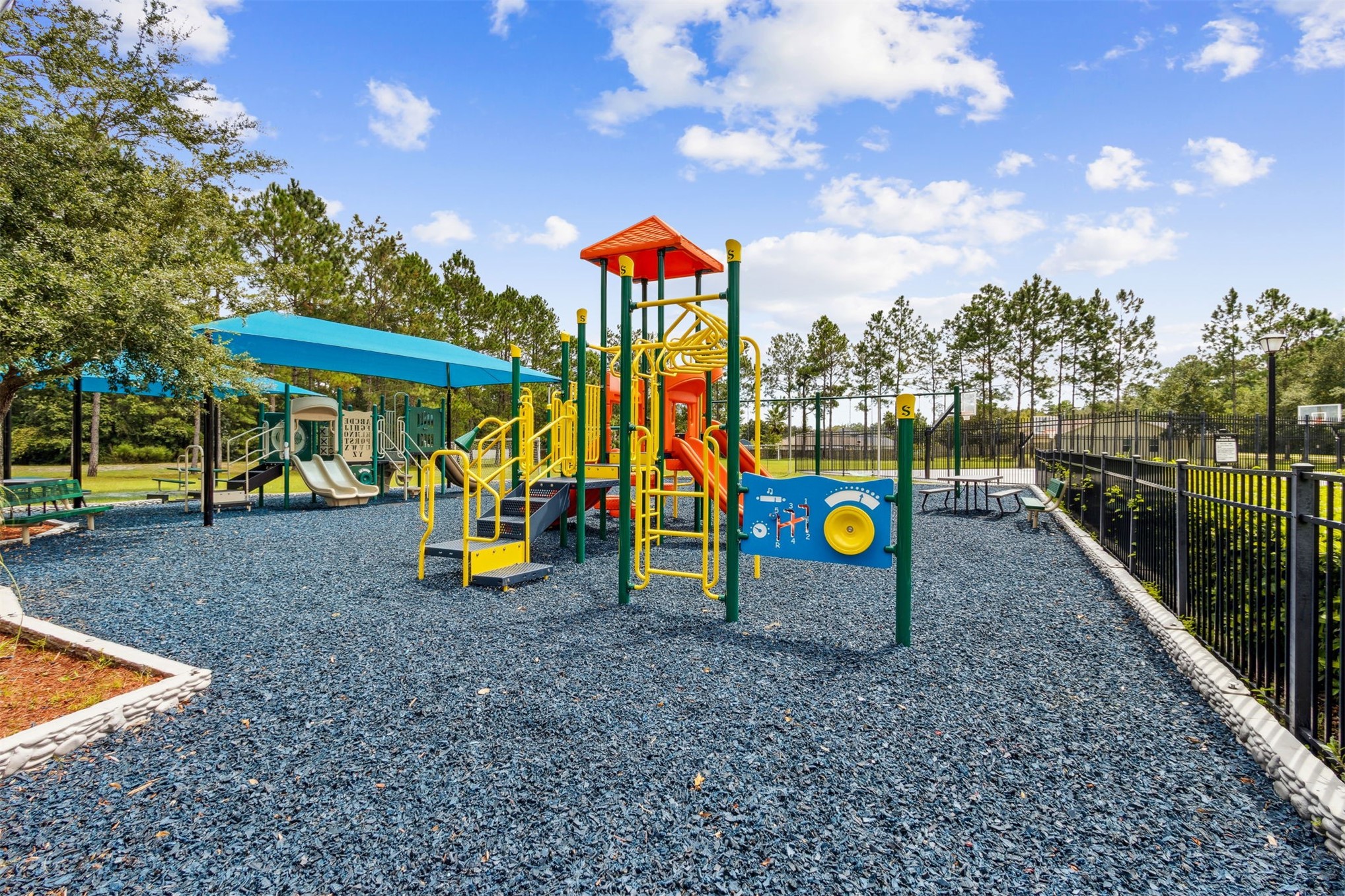 76002 Tideview Lane Yulee, FL 32097 - Photo 54 of 58 a view of a park with slide
