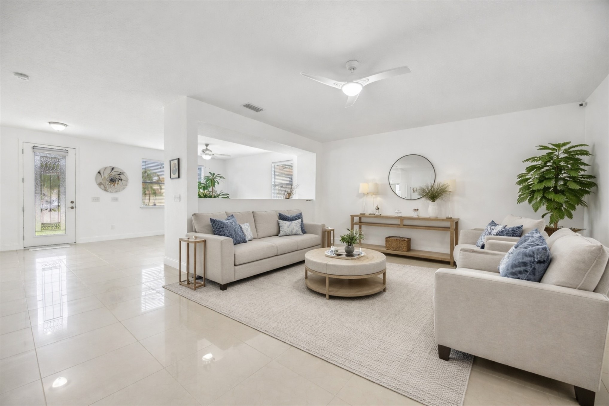 76002 Tideview Lane Yulee, FL 32097 - Photo 7 of 58 a living room with furniture and a wooden floor