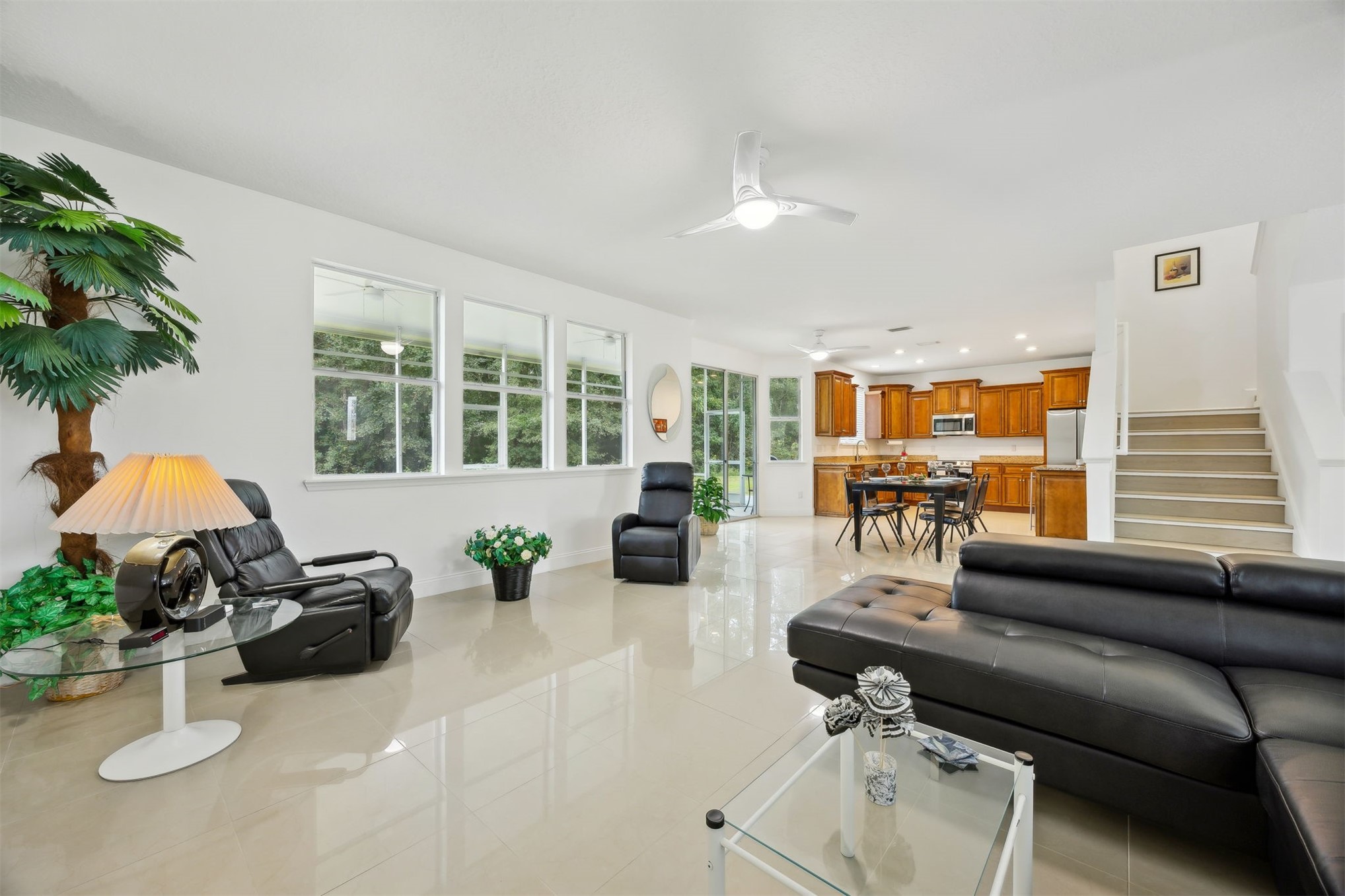76002 Tideview Lane Yulee, FL 32097 - Photo 10 of 58 a living room with furniture and a potted plant