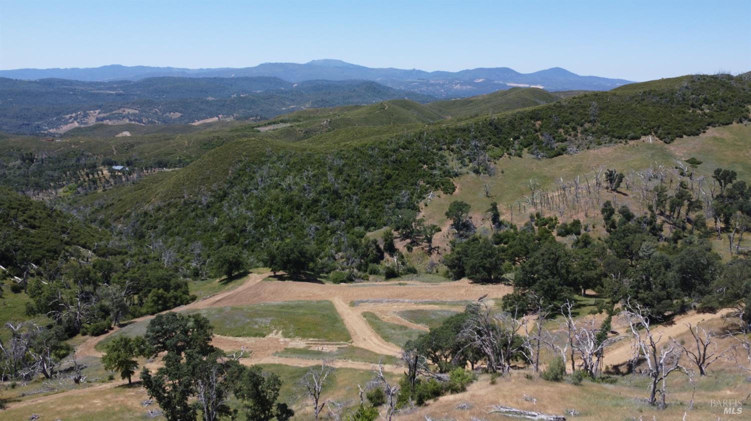 Undisclosed Address Lower Lake, CA 95457 - Photo 13 of 26 an aerial view of a forest
