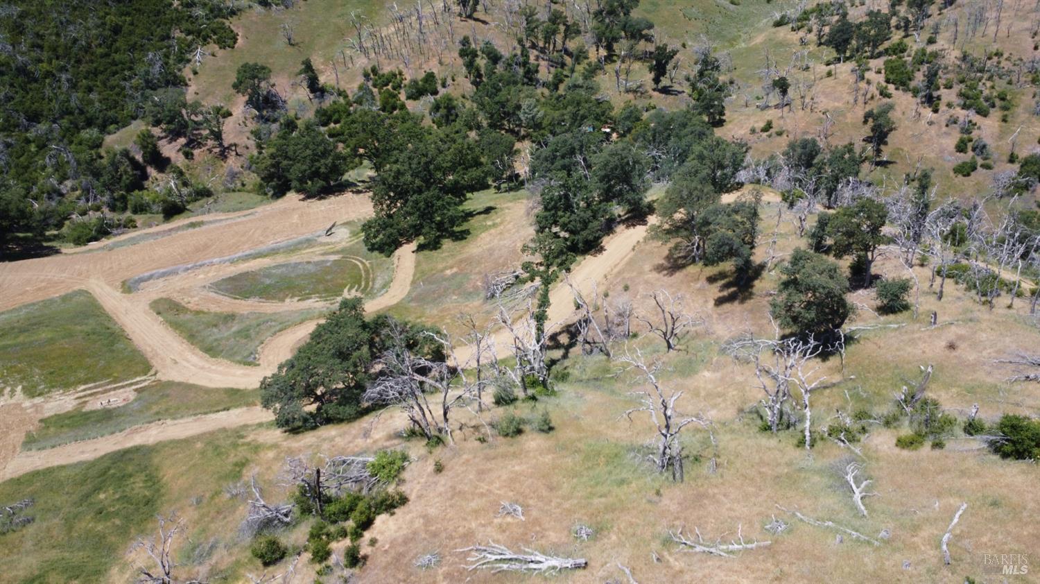 Undisclosed Address Lower Lake, CA 95457 - Photo 20 of 26 a view of a dry yard with wooden fence