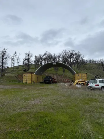 a view of mountain with lake view