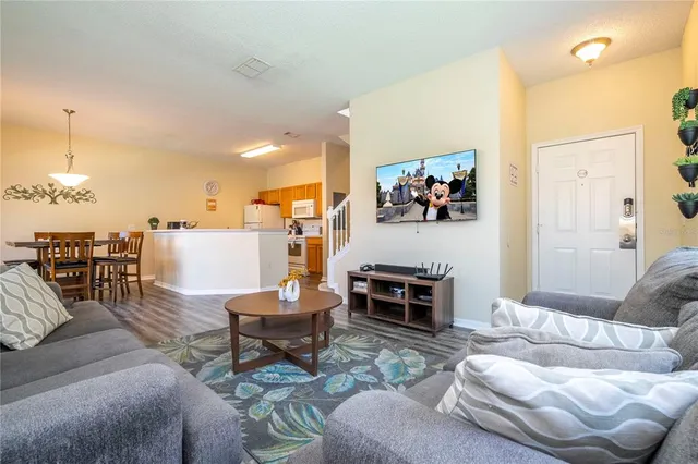 a kitchen with a sink and a stove top oven