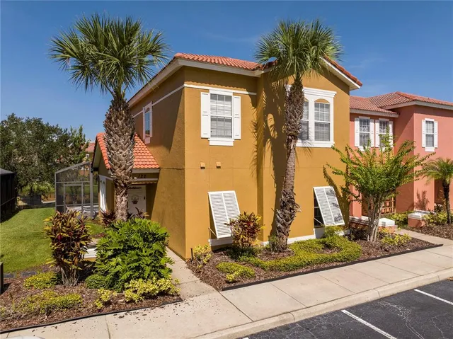 an aerial view of a house with a garden