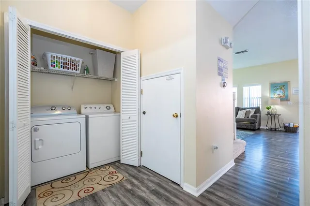 a bedroom with bed and window