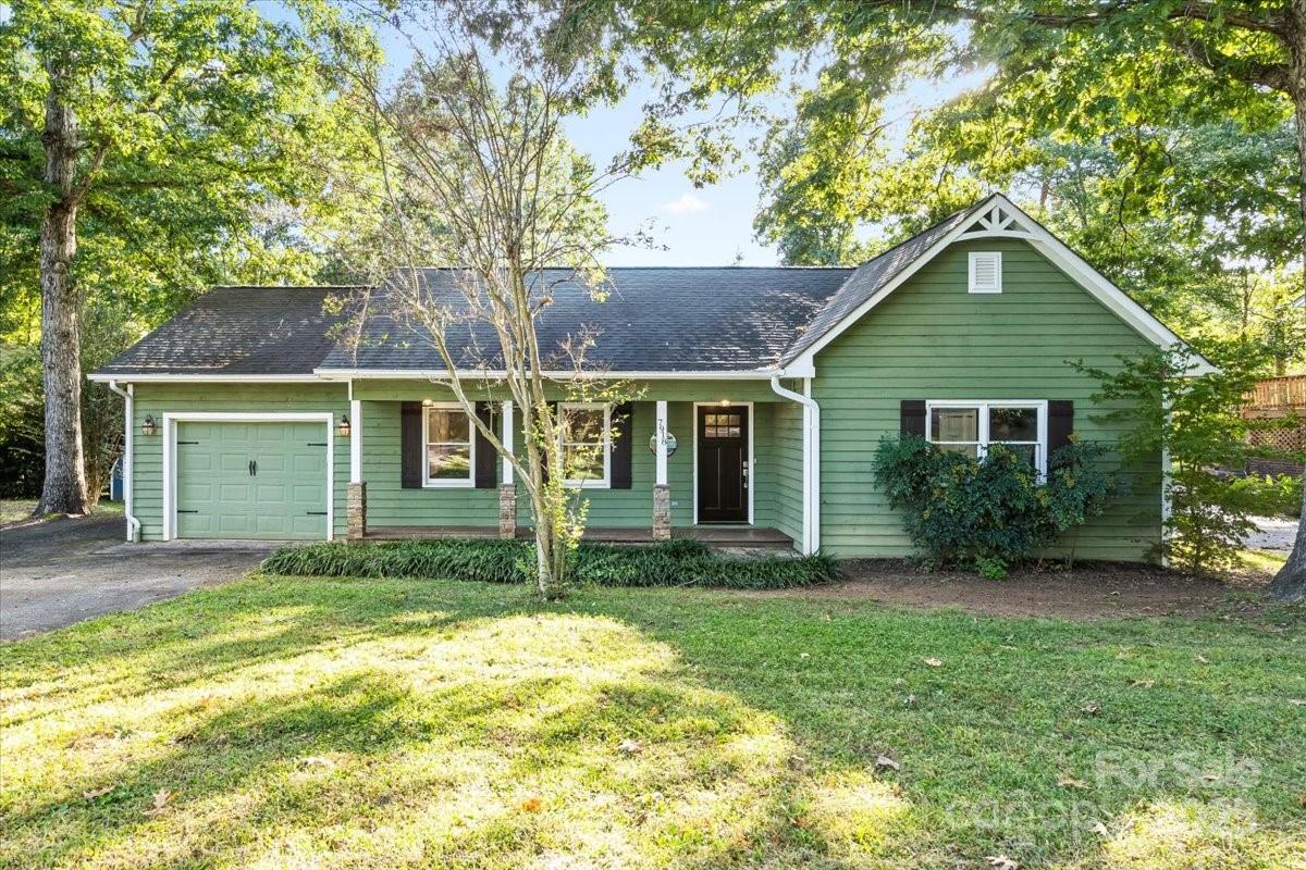 7918 Sarah Drive Denver, NC 28037 - Photo 1 of 31 a view of a house with a yard and large tree