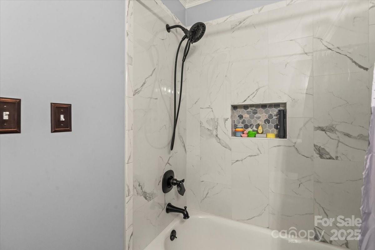 7918 Sarah Drive Denver, NC 28037 - Photo 19 of 31 a bathroom with a shower