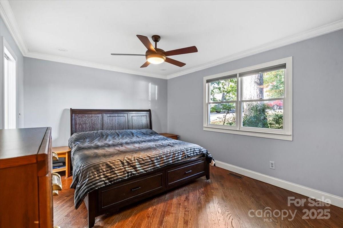 7918 Sarah Drive Denver, NC 28037 - Photo 20 of 31 a bedroom with a bed and a window