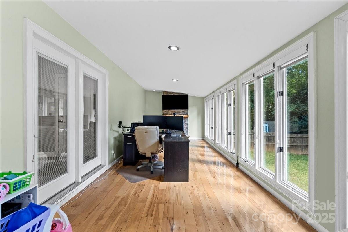 7918 Sarah Drive Denver, NC 28037 - Photo 25 of 31 a view of a living room hardwood floor and a large window