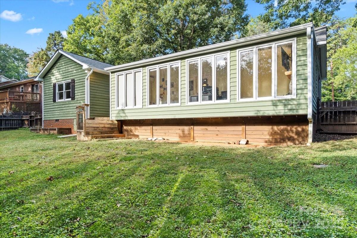 7918 Sarah Drive Denver, NC 28037 - Photo 28 of 31 a front view of a house with a yard