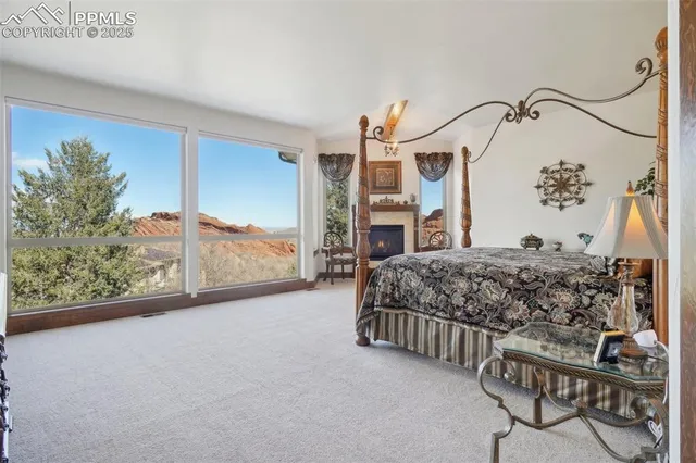 a spacious bathroom with a tub sink and mirror