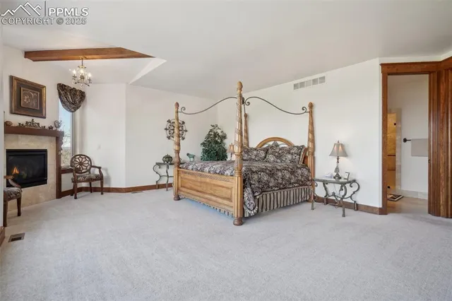 a bathroom with a tub shower and sink