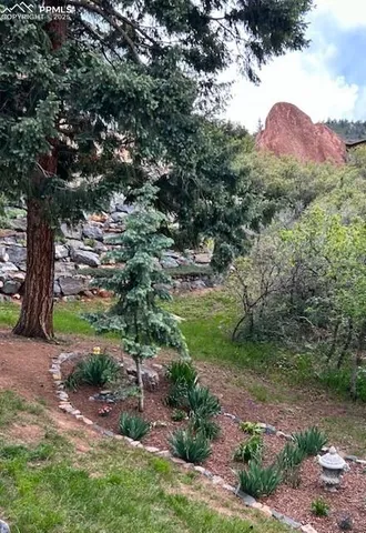a bedroom with furniture and a chandelier