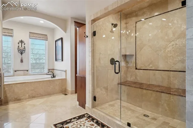 a view of a yard with wooden fence