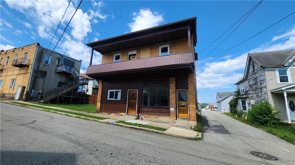 716 Hawthorne Street Vandergrift, PA 15690 - Photo 2 of 11 a view of a house with a patio