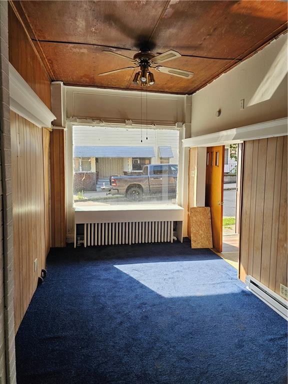 716 Hawthorne Street Vandergrift, PA 15690 - Photo 5 of 11 a view of a room with stairs and a ceiling fan