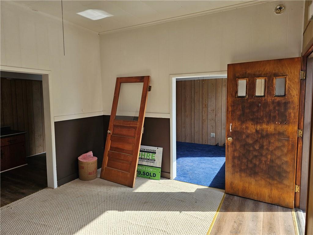 716 Hawthorne Street Vandergrift, PA 15690 - Photo 7 of 11 a bedroom with a bed and wooden floor